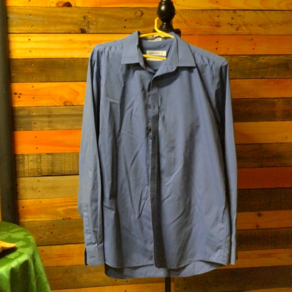 Blue and black fine striped Calvin Klein size Large button down casual shirt.